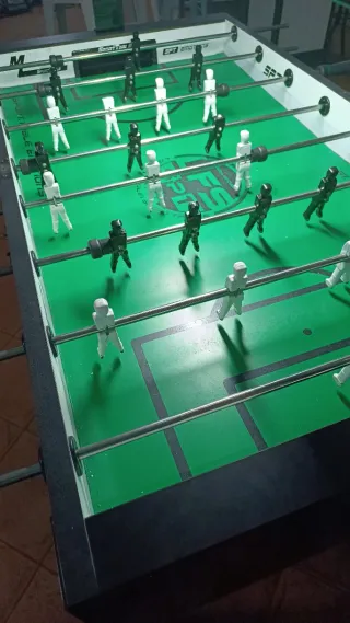 Futbolín con monedero