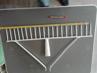 Rezón ancla antiguo de hierro y otras cosas