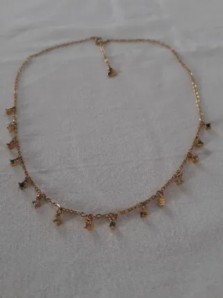 Collana donna color oro con ciondoli