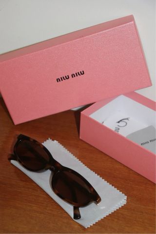 Óculos de Sol Miu Miu - MU 04ZS 19P2Z1 Tortoise