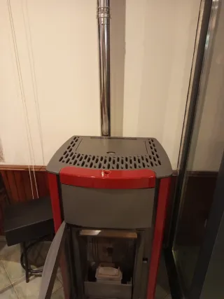 Estufa pellets 200m2 seminueva + chimenea