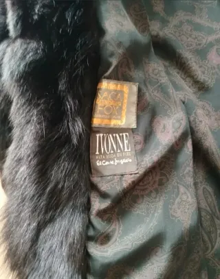 Abrigo de piel negro de alta calidad