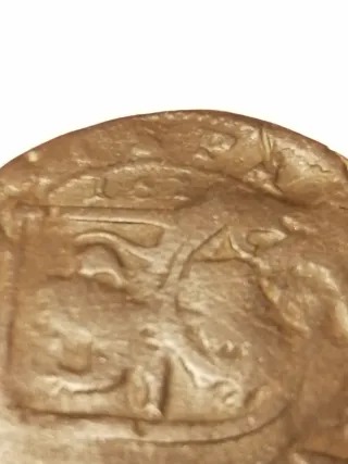 Moneda Felipe III resellada