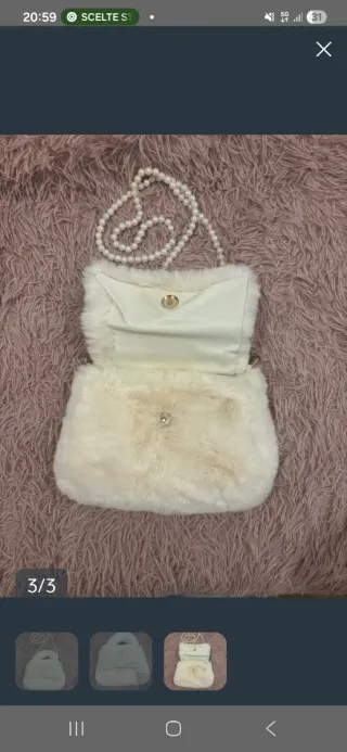 Bolso blanco con cadena de perlas