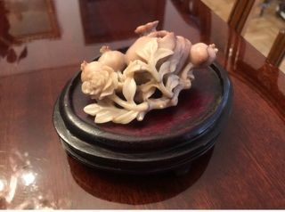 Figura decorativa oriental de piedra