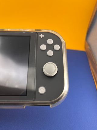 Nintendo Switch Lite + 3 Giochi