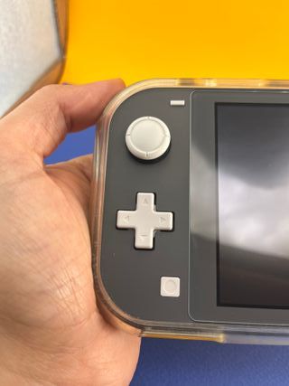 Nintendo Switch Lite + 3 Giochi