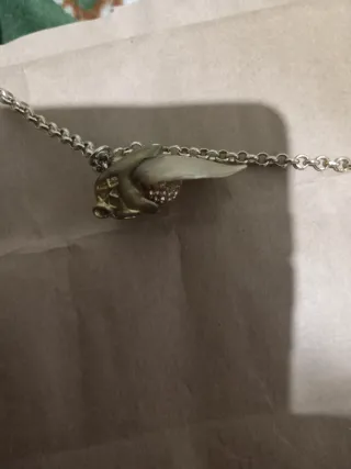 Colgante dorado con forma de pantera