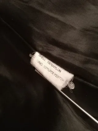 Parka guateada negra mujer