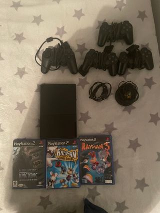 PlayStation 2 Negra con 3 Juegos y Mandos