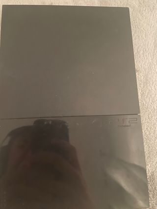 PlayStation 2 Negra con 3 Juegos y Mandos