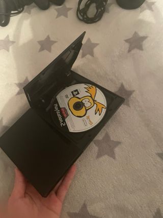 PlayStation 2 Negra con 3 Juegos y Mandos