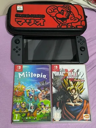 Nintendo Switch + 3 Juegos: Miitopia, FIFA 20, Dra