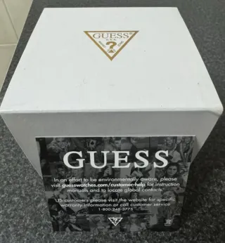 Vendo o cambio Reloj Guess Negro y Dorado