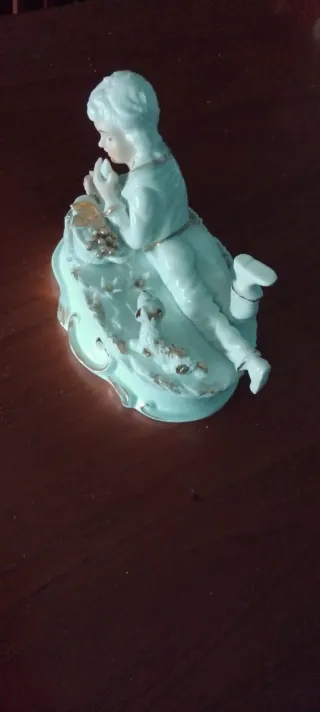 Figura porcelana niño con perro