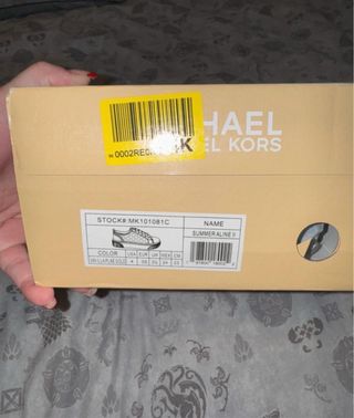 Zapatillas Michael Kors Blancas y Doradas