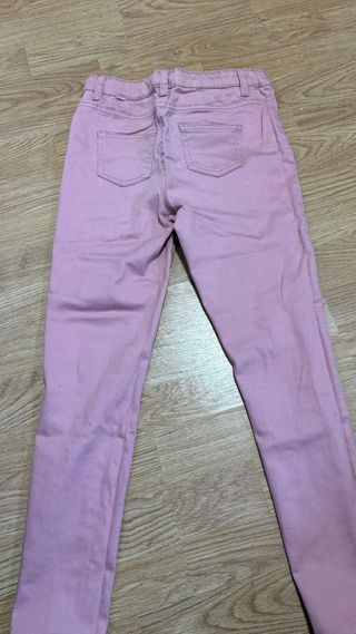 Pantalones vaqueros rosas rotos talla 10-11 años