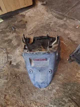 Portamatrículas Sym