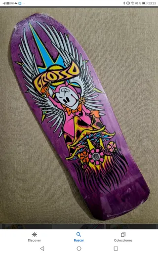 Tabla de skate morada con diseño.. Se cambia