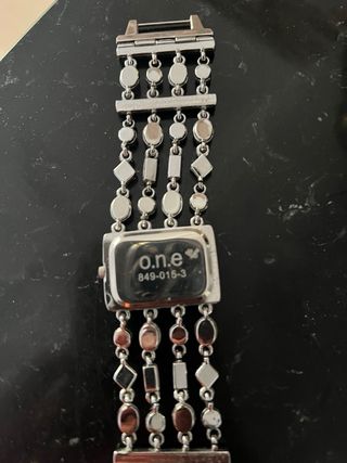 Reloj de pulsera con dijes