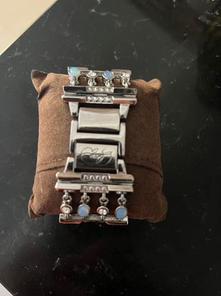 Reloj de pulsera con dijes