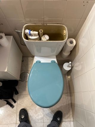 Fontanero ,  cambio de flotador y descargador.