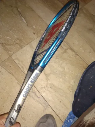 Raqueta de tenis boomerang