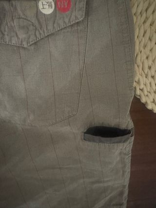Pantalón corto Nike gris talla L