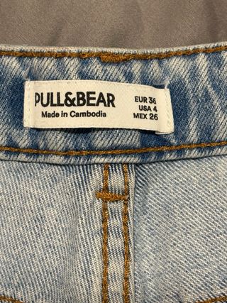 Pantalón vaquero largo desgastado