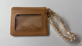 Cartera Michael Kors con cadena dorada