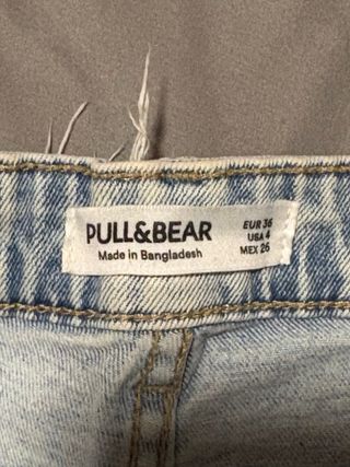 Pantalón vaquero largo desgastado