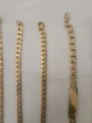 Pulseras chapadas en oro anchas