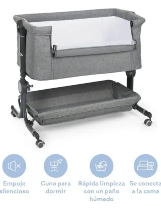 Minicuna gris con ruedas y cesta