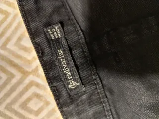 Falda vaquera negra con botones