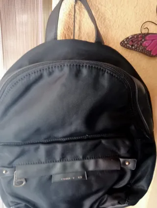 Mochila azul marino para mujer.