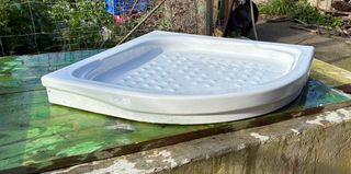 Plato de ducha de cerámica blanco