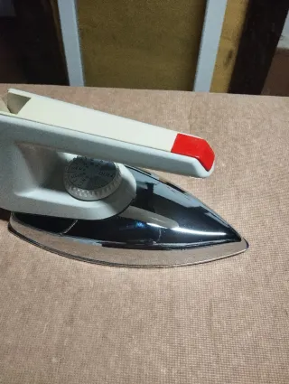 Tabla y Plancha antigua