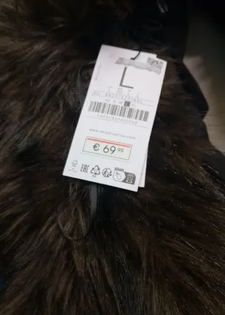 Chaquetón de pelo marrón y negro