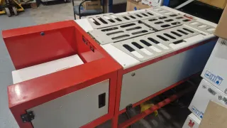 Plegadora de camisetas industrial