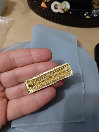 Spilla vintage dorata con strass