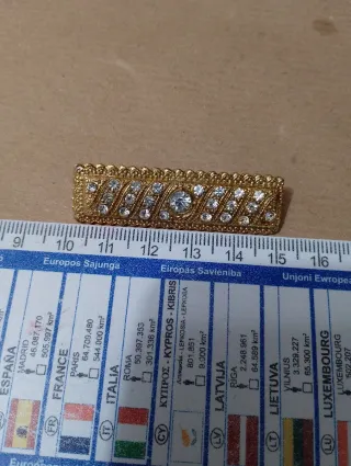 Spilla vintage dorata con strass