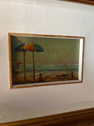 Quadro con cornice dorata scena marina