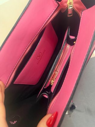 Borsa a mano fucsia con logo V