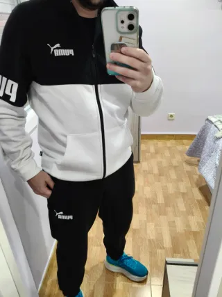 Conjunto deportivo Puma negro y blanco