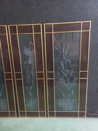 Cristales grabados con varillas doradas