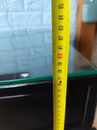 Escritorio  madera con superficie de cristal