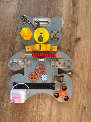 Panel de actividades sensoriales para bebés