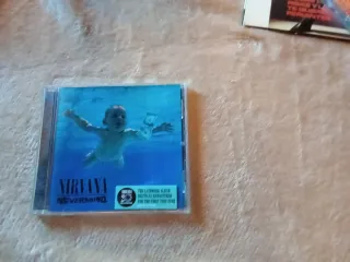 CD NIRVANA (2) Y COLDPLAY