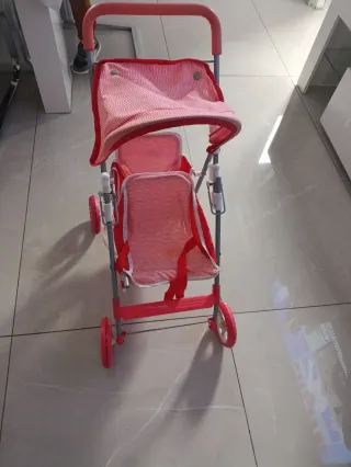 Cochecito de muñecas rosa