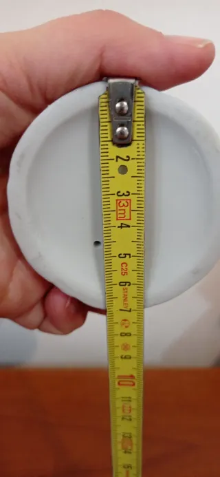 Statuina in porcellana bianca putto che suona